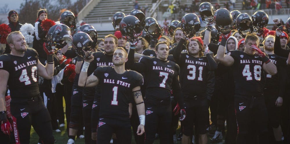 The Ball State football team sings the fight song after the game against Eastern Michigan on Nov. 22 at Scheumann Stadium. Ball State won 45-30. DN PHOTO BREANNA DAUGHERTY