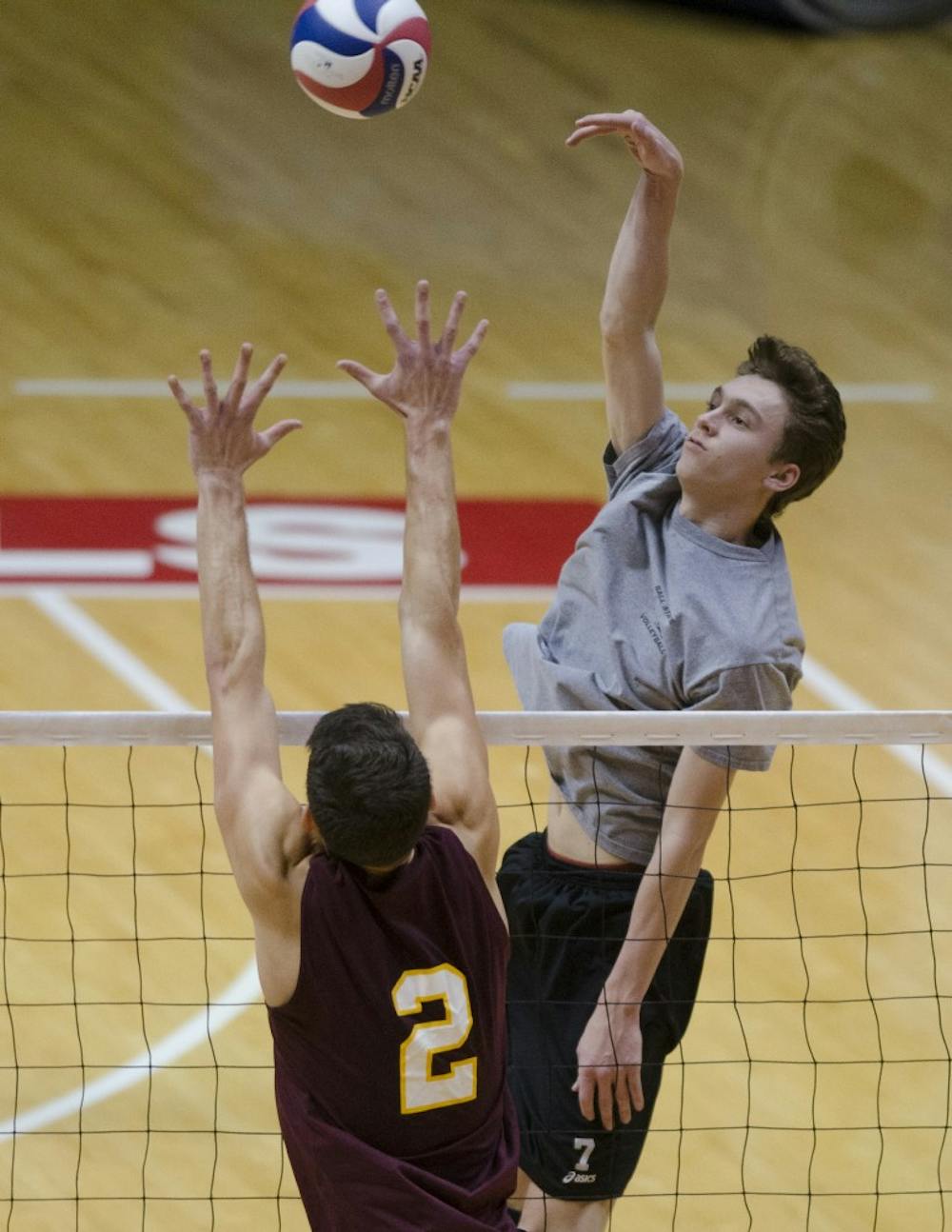 Junior outside attacker Shane Witmer knocks the ball over the net against Loyola on Nov. 10 at Worthen Arena. DN PHOTO BREANNA DAUGHERTY 