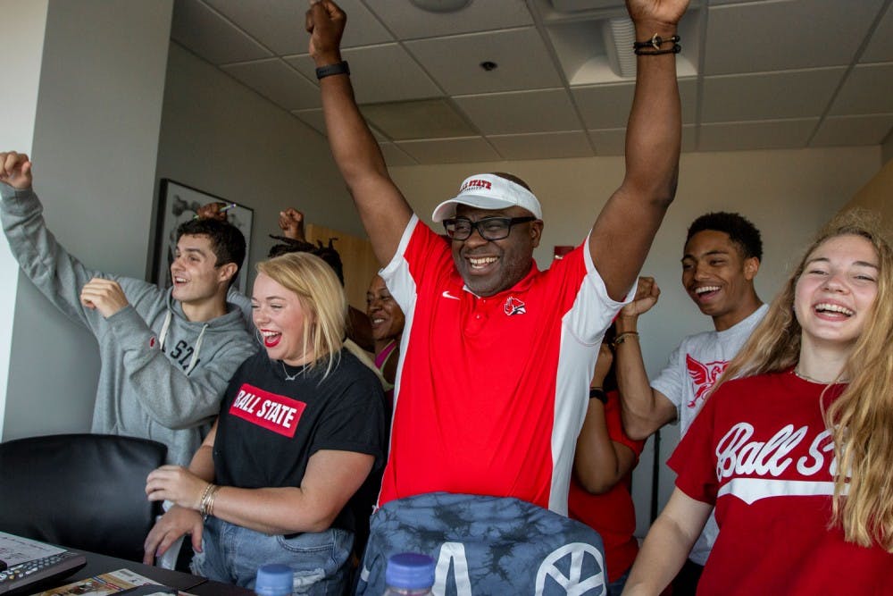 Henry Hall (center) cheers on the Cardinals at a football game with family and friends from his company’s suite in Scheumann Stadium. Hall will serve as a member of Ball State's Board of Trustee until December 2022. Ball State University, Photo Courtesy