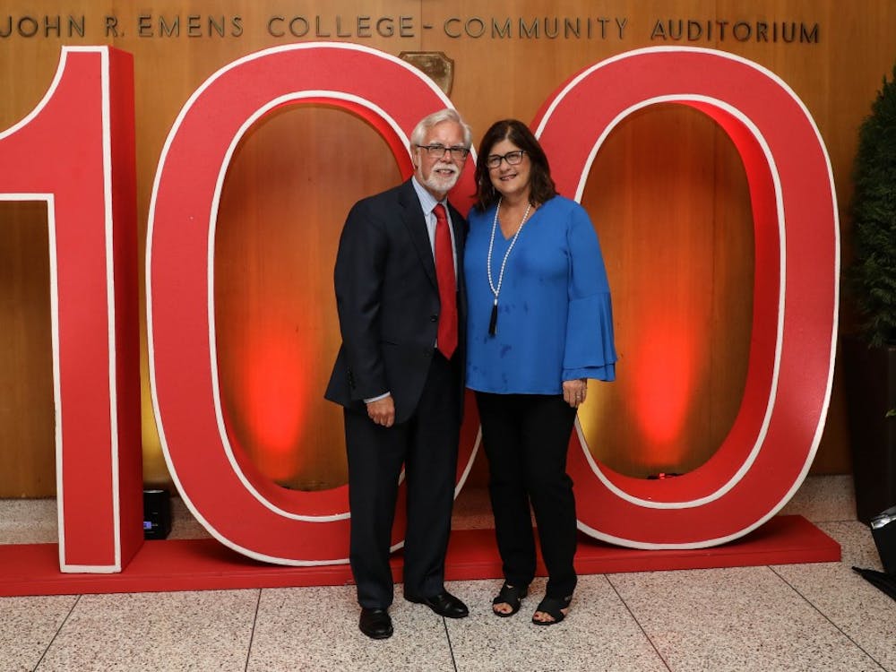 Indiana Senator Timothy S. Lanane and his wife Cindy stand infront of Ball State's 100 sign celebrating a century of being open Thursday, Sept. 6, 2018, at Emens Auditorium. The documentary "From Normal to Extraordinary: Ball State's First Century," premiered &nbsp;at the event. Rebecca Slezak,DN
