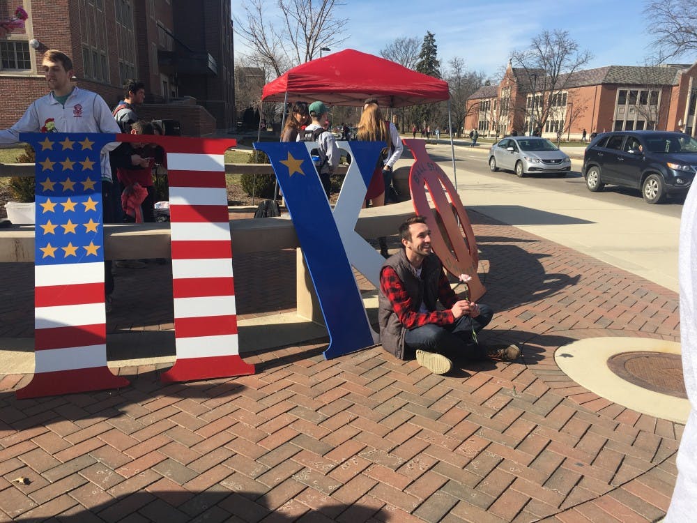 Pi Kappa Phi gave out free&nbsp;hugs, flowers and handmade cards at&nbsp;the&nbsp;Scramble Light on Feb. 14. The group aimed to&nbsp;spread the inclusion and awareness in partnership with Best Buddies on Valentines Day. Kersten&nbsp;Collins // DN
