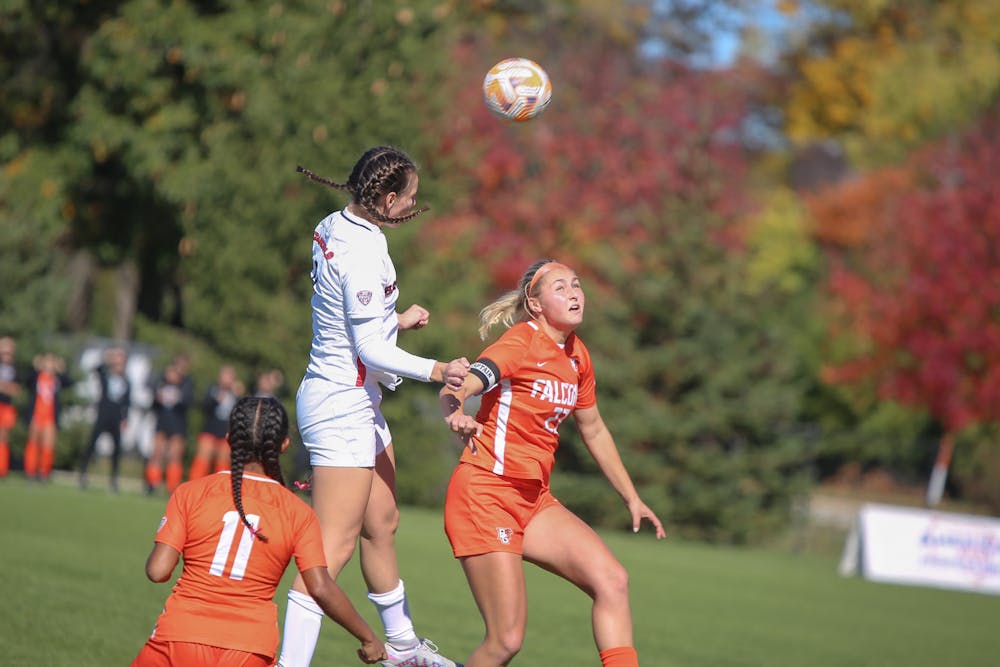 Sophomore forward Emily Roper hits a head ball from a punt kick in a game against Bowling Green Oct. 22 at Briner Sports Complex. Roper was responsible for Ball States one goal against the falcons. Andrew Berger, DN