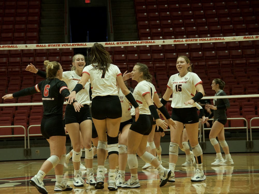Players on the Ball State Women's Volleyball team celebrate a point in a game against Western Michigan Oct. 22 at Worthen Arena. Carolina Stalvey, DN