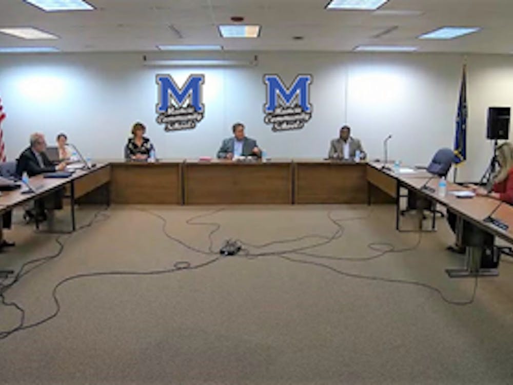 The Muncie Community Schools (MCS) Board of Trustees discusses support staff hourly pay at its meeting July 27, 2021. The board voted to increase hourly pay and it will reveal its district reopening plan next week. Andy Klotz, Muncie Community Schools, Photo Provided