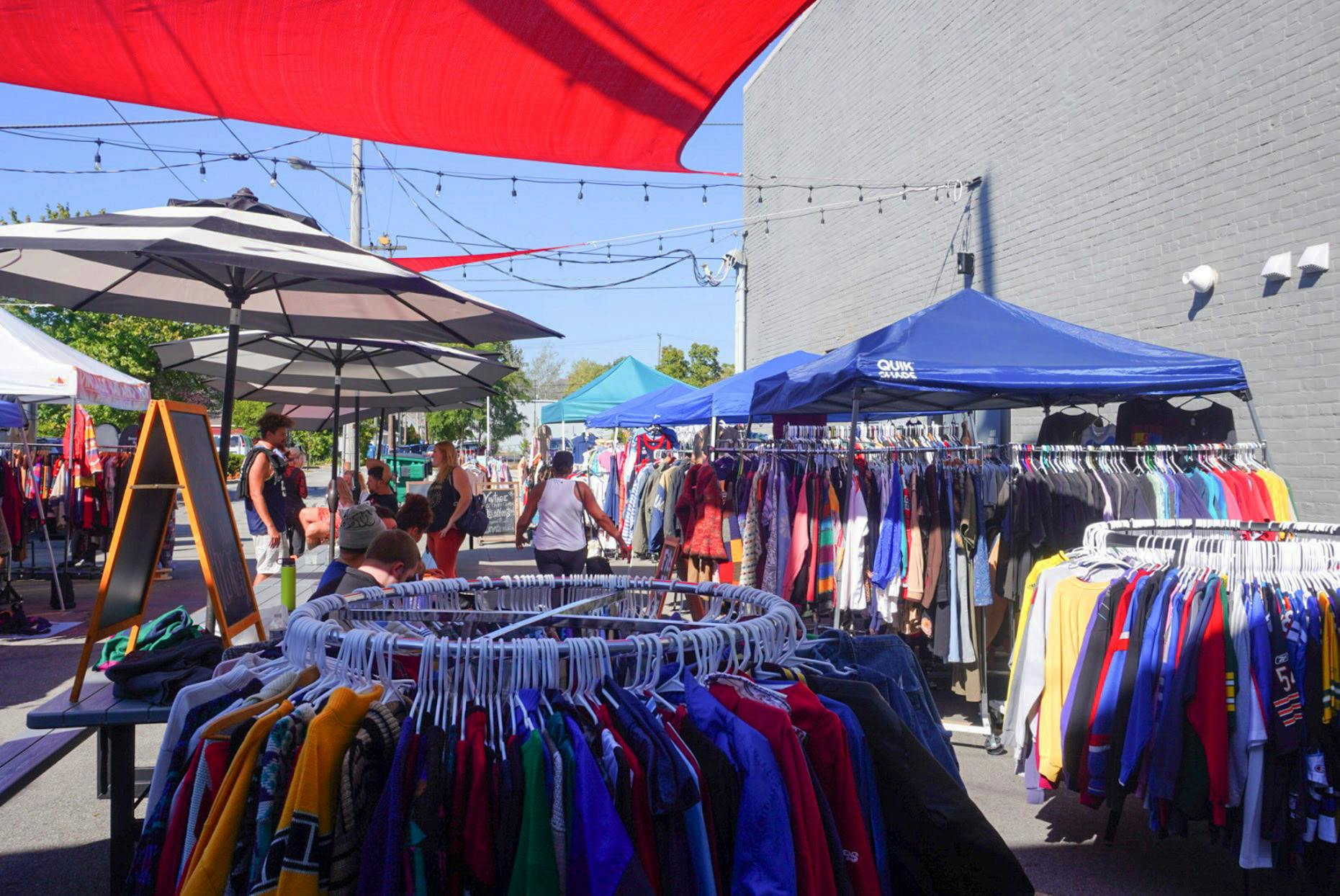  Vintage clothes hang from racks Sept. 30 at Primeval Brewing in Noblesville. The clothing was provided from Vintage Society Indiana. Jose Padilla, DN