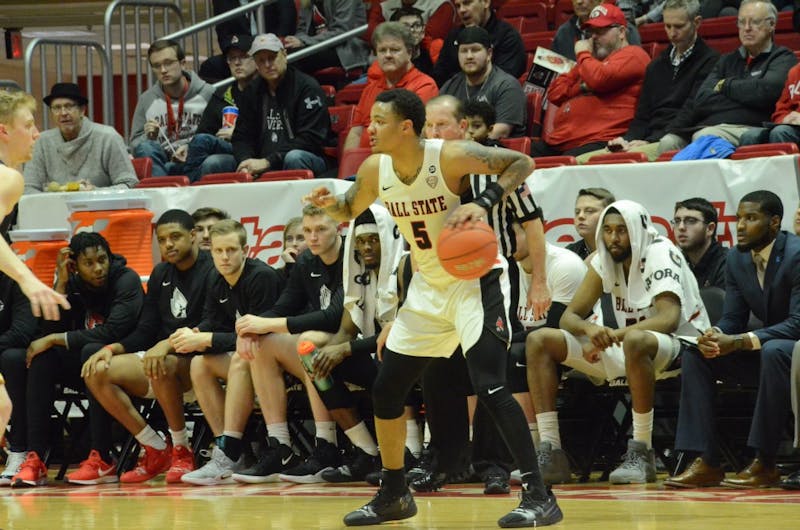 Sophomore guard Ishmael El-Amin looks for an open teammate during a game against Toledo on Feb. 27 at Worthen Arena. The Cardinals lost 80-72. Jack Williams, DN