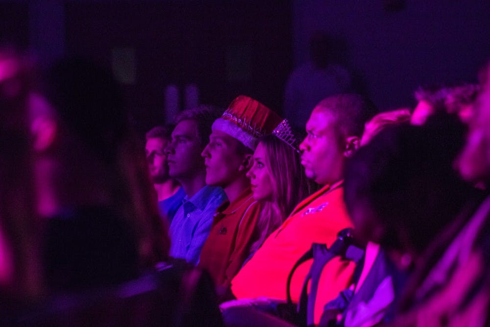 The Homecoming Court watches performances during the 32nd annual Talent Search at Emens Auditorium on Oct. 18. Reagan Allen // DN