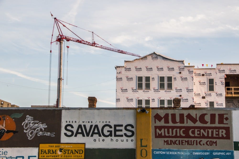 <p>Construction on the Village Promenade is underway in The Village. The apartment is on track for completion by its Aug. 16 move-in date. DN PHOTO JONATHAN MIKSANEK</p>