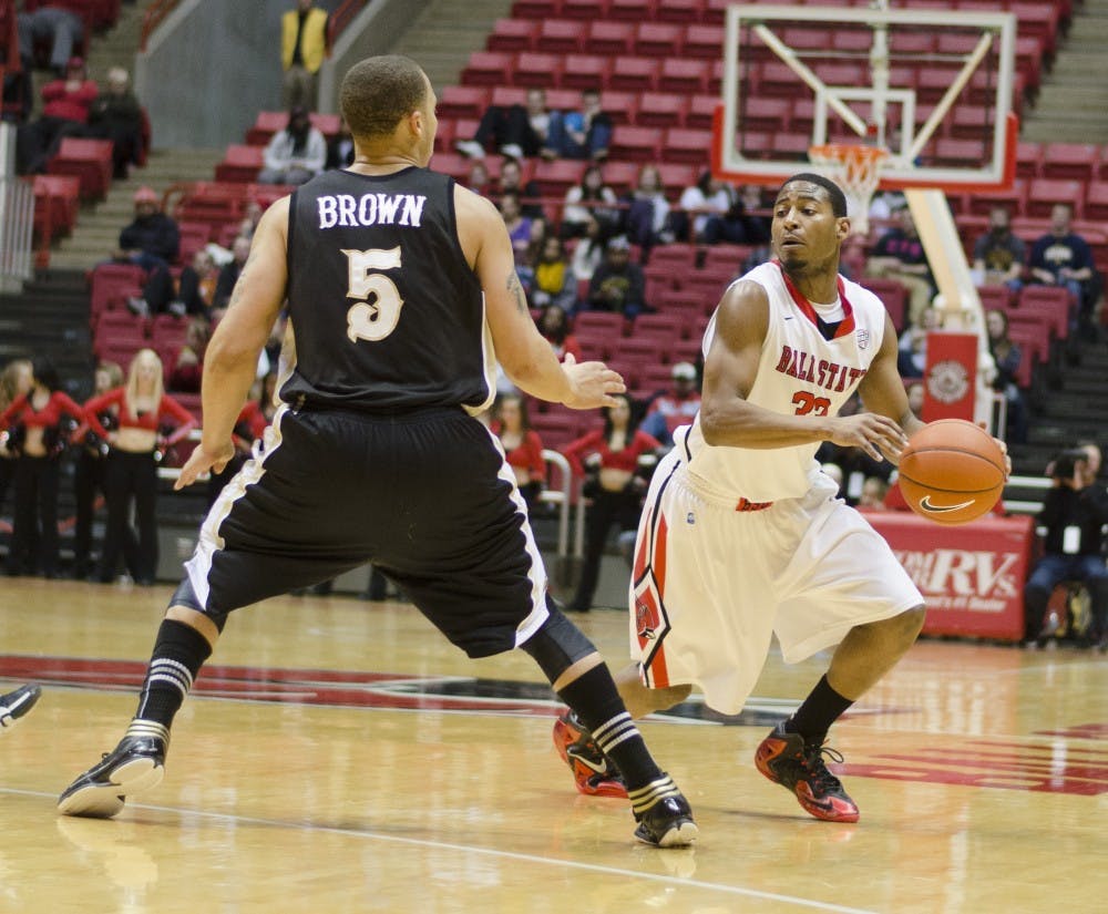 Senior guard Jesse Berry drives the ball past a Western Michigan player on Feb. 26 at Worthen Arena. Berry scored 17 points for Ball State. DN PHOTO BREANNA DAUGHERTY 