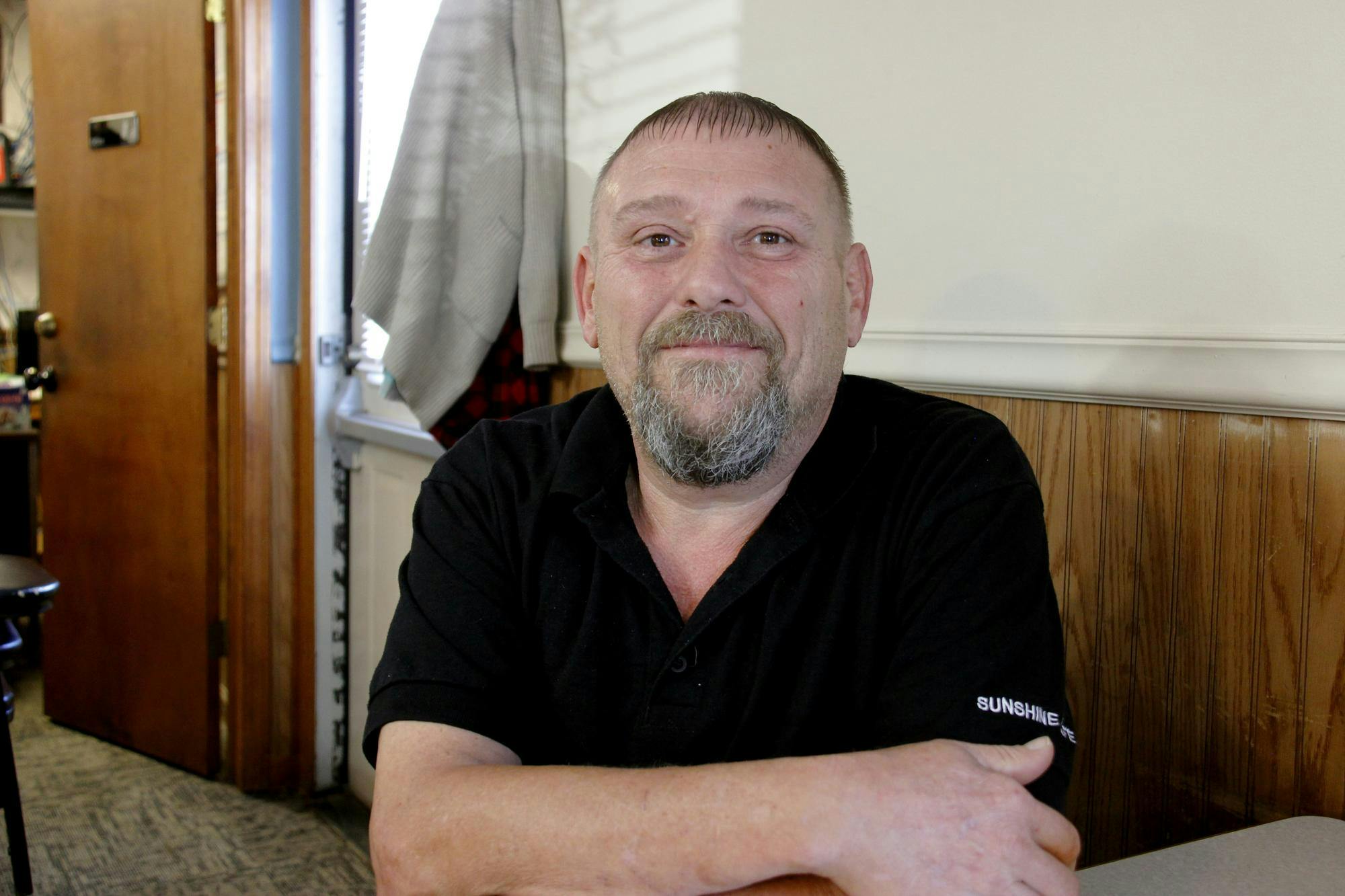 Sunshine Cafe owner Jarrad Buck sits for a photo Sept. 3 in Sunshine Cafe. Buck had worked at Sunshine Cafe since he was a teenager and does not want to mess up the legacy his dad built. Kate Hill, DN