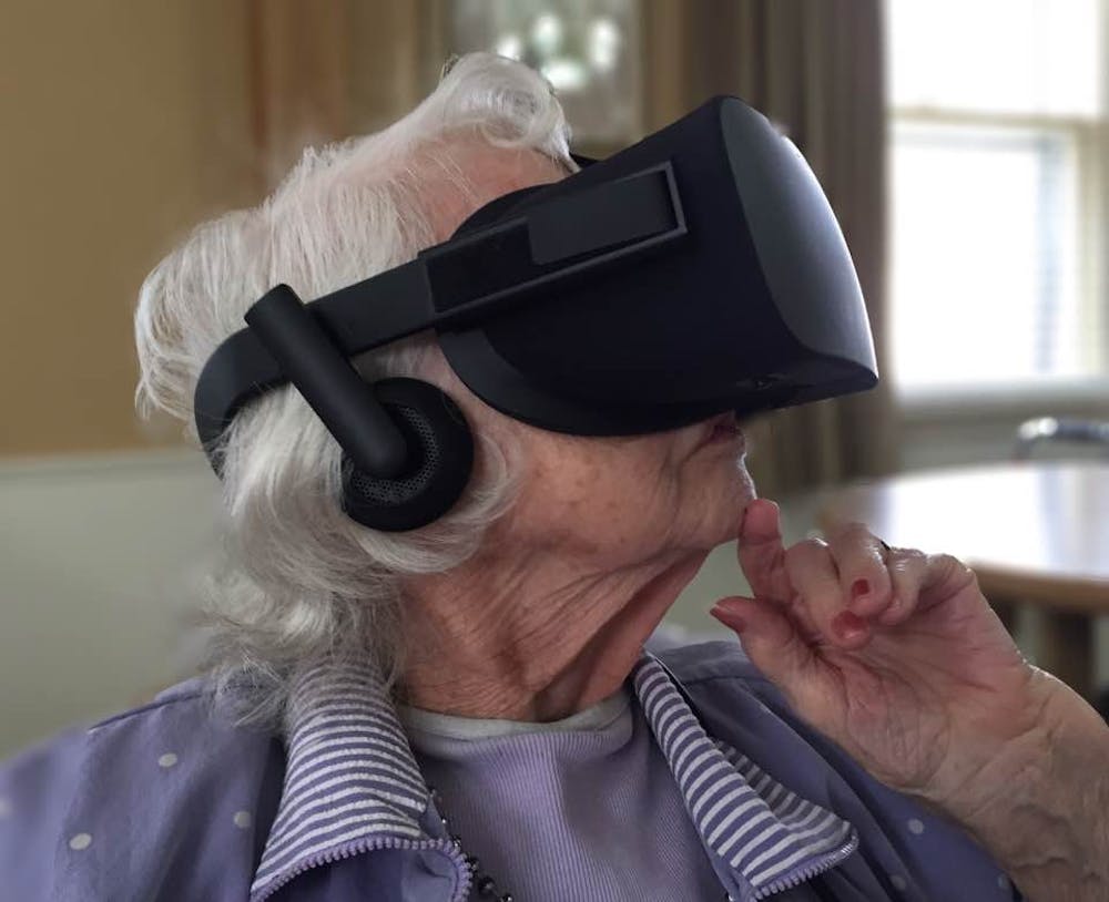 <p><em>A nursing home resident tries virtual reality. // Photo provided by Mike Gerhard.&nbsp;</em></p>