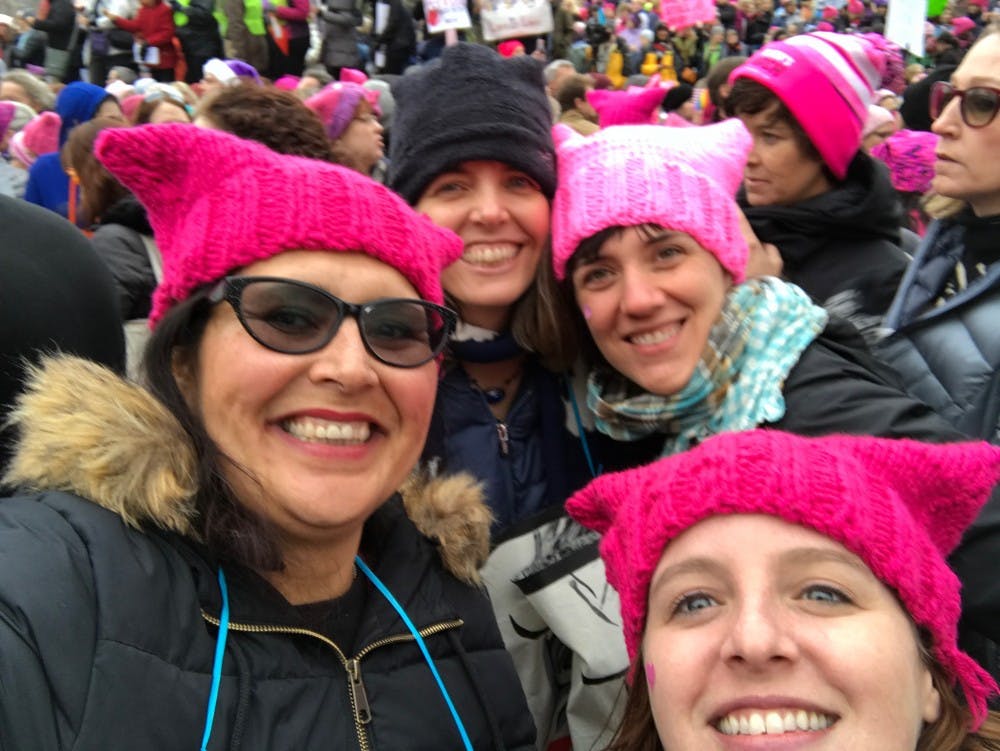 <p>(From left) Ball State art professors&nbsp;Michelle Duran, Jacinda Russell, Hannah Barnes and Natalie&nbsp;Phillips&nbsp;pose for a group photo during the Women's March on Jan. 21. The professors traveled to Washington, D.C. to protest the inauguration of President Trump. &nbsp;//&nbsp;<em>Photo Provided</em></p>