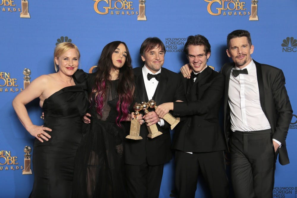 Members of "Boyhood" backstage at the 72nd Annual Golden Globe Awards show at the Beverly Hilton Hotel in Beverly Hills, Calif., on Sunday, Jan. 11, 2015. (Lawrence K. Ho/Los Angeles Times/TNS)
