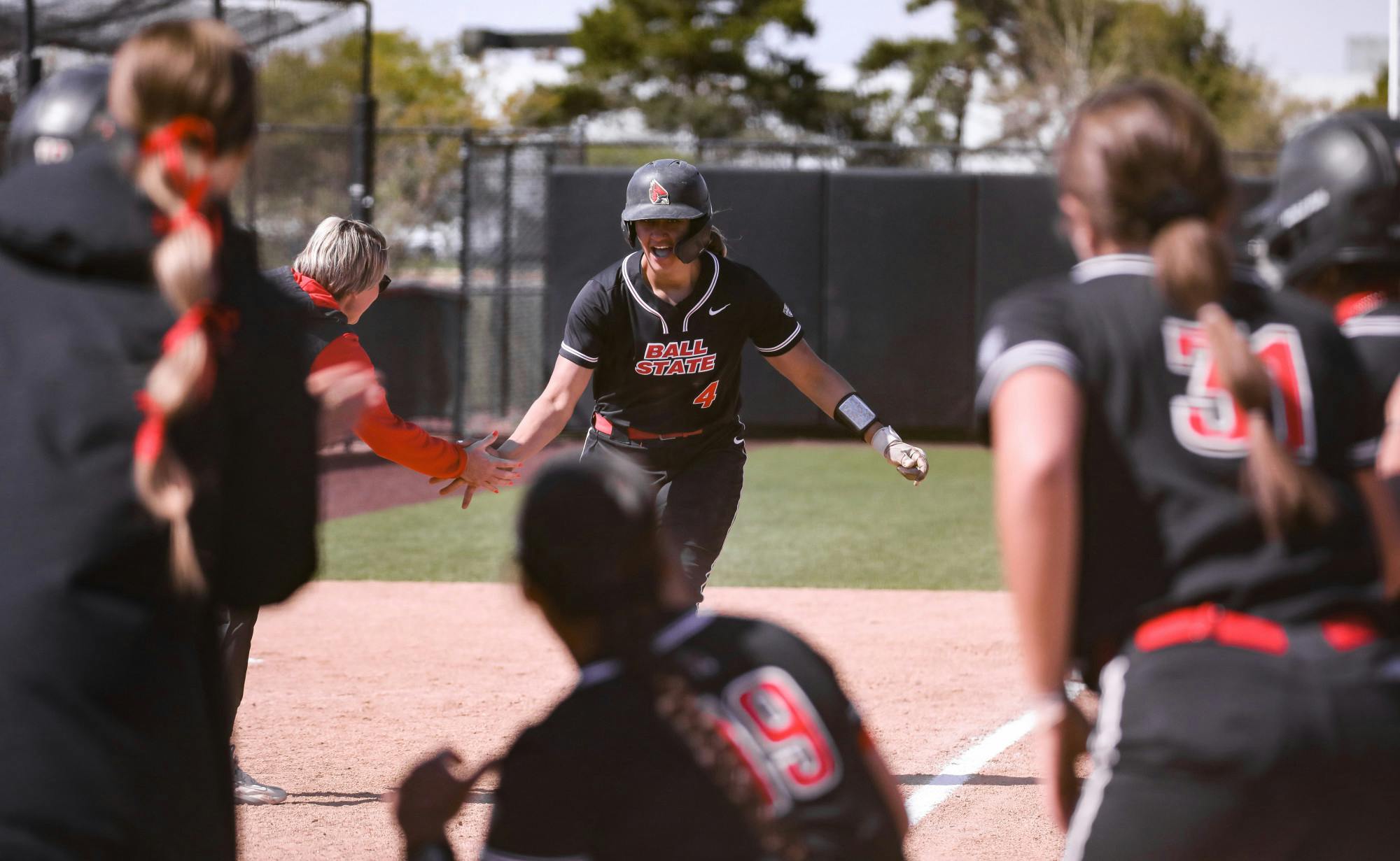 Redshirt sophomore McKayla Timmons scores after a homerun in a game against Miami on April 26 at the Softball Field at First Merchants Ballpark Complex. Timmons scored two runs, one homerun, and had three RBI's. Katelyn Howell, DN
