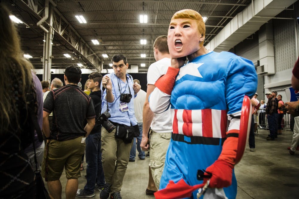 Some dressed in vibrant attire to show their support for 2016 presidential candidate Donald Trump on April 20. DN PHOTO TRENT SCROGGINS