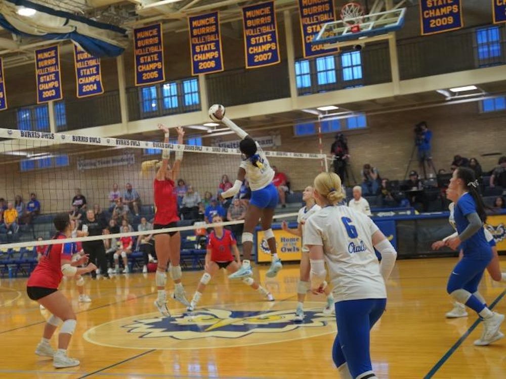 Junior JaMaria Jackson elevates to spike the ball into Southern Wells territory. The kill helped lead Burris to a straight sets sweep of the Raiders. PHOTO BY BRODRICK GOOD