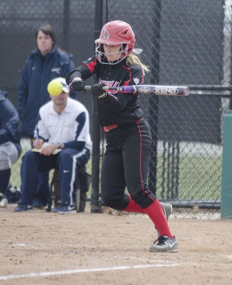 Junior Loren Cihlar hits the ball against Toledo April 6 at the Ball State Softball Complex. DN PHOTO BREANNA DAUGHERTY