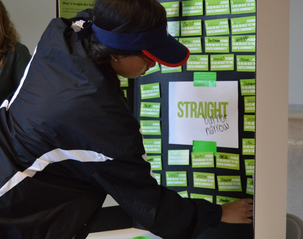 <p>Straight But Not Narrow is a non-profit charity based out of Los Angeles that focuses on straight youth and young adults. Students pledged to be allies to the LGBT community at Ball State March 30 in the Letterman Building.<em>&nbsp;</em><em>DN PHOTO ALLIE KIRKMAN</em></p>