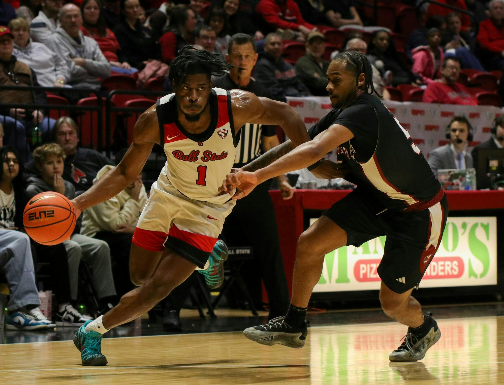 Ball State senior guard Elmore James IV drives toward the goal Feb. 24 at Worthen Arena. James IV has played a total of 658 minutes during his Ball State Career. Adam Jones, DN