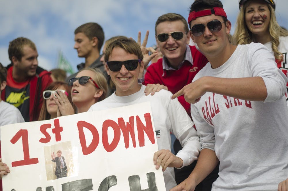 Students in the Nest pose for a photo during the football game against Indiana State on Sept. 13 at Scheumann Stadium. DN PHOTO BREANNA DAUGHERTY 