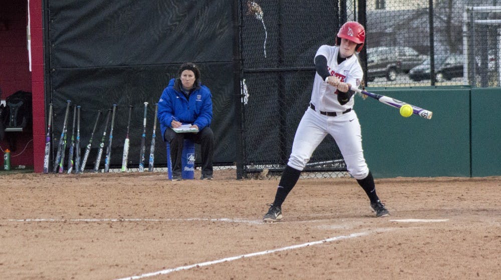 Freshman catcher Leigh McAnally hits against IPFW March 18 at the Softball Field at the First Merchants Ballpark Complex.  DN PHOTO MAKAYLA JOHNSON