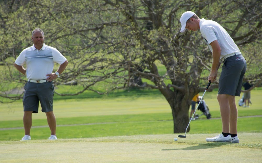 <p>Senior Michael VanDeventer putts the ball at hole 11 during the Earl Yestingsmeier Memorial Invitational on April 14, 2014, at the Delaware Country Club. The Cardinals are playing in the Crooked Stick Invitational in Carmel, Ind. Oct. 16-17. Kaiti Sullivan,DN File</p>