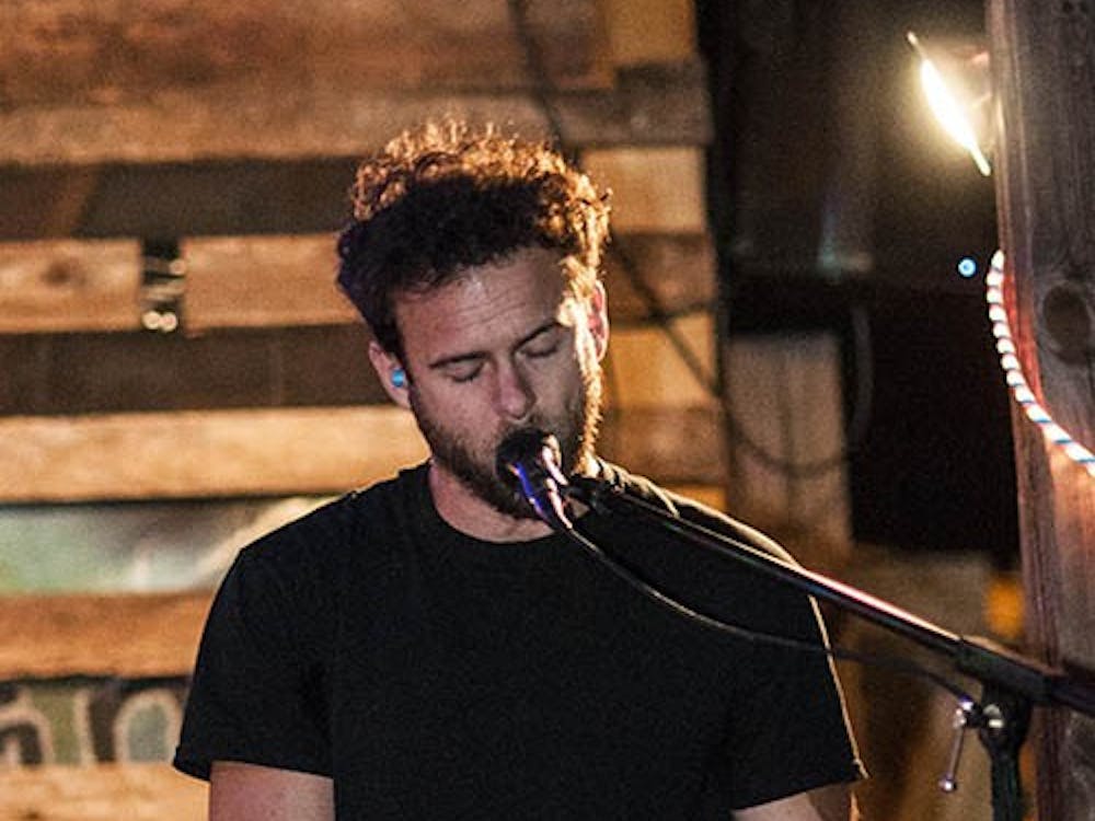 Mutts keyboardist Mike Maimone sings during one of their songs on Sept. 14. DN PHOTO JONATHAN MIKSANEK