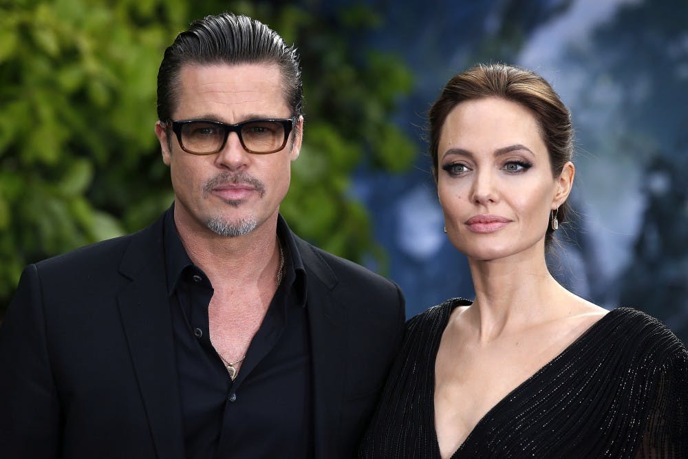 In this file image from 2014, Brad Pitt and his wife Angelina Jolie attend the premiere of Maleficent at Kensington Palace, London. Jolie has filed for divorce, TMZ reported on Sept. 20, 2016. (Justin Tallis/PA Wire/Zuma Press/TNS) 