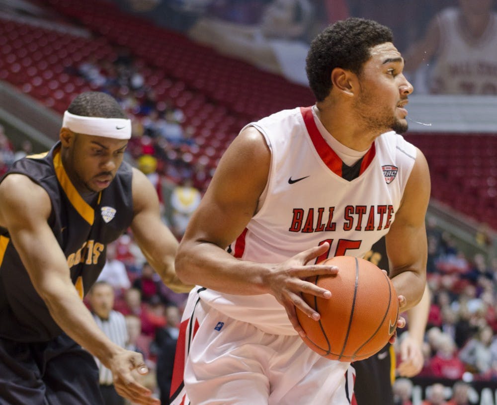 Freshman forward Franko House looks for an open teammate to pass the ball to during the Toledo game Feb. 8 at Worthen Arena. House has played in 21 games this season. DN PHOTO BREANNA DAUGHERTY 