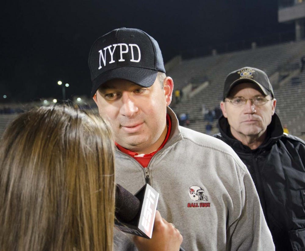 Coach Pete Lemobo talks with ESPN after the game. Both this game and the next one on Nov. 14 at 8 p.m. will be televised on an ESPN network. DN PHOTO COREY OHLENKAMP