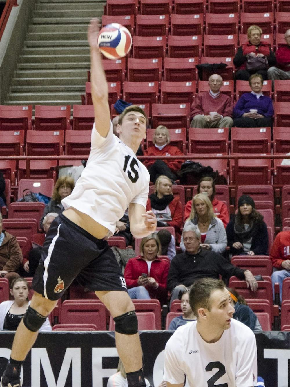 Sophomore outside attacker Marcin Niemczewski sets the ball during a match against Sacred Heart on Jan. 11 in Worthen Arena. Ball State swept the match, taking all three sets to end the game. DN PHOTO COREY OHLENKAMP