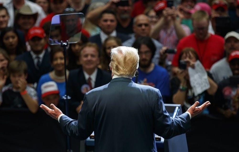 President Donald Trump speaks at the Northside Gymnasium in Elkhart, Indiana, Thursday May 10, 2018, during a campaign rally. AP Photo
