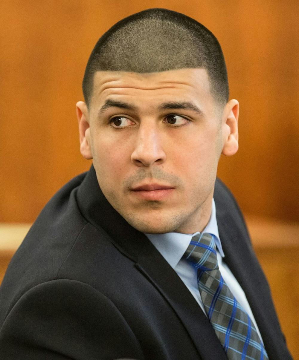 Former New England Patriots tight end Aaron Hernandez listens during his murder trial on Tuesday, March 31, 2015, at Bristol County Superior Court in Fall River, Mass. Hernandez was convicted of first-degree murder in the 2013 killing of Odin Lloyd on Wednesday, April 15, 2015, and sentenced to life in prison without the possibility of parole. (Aram Boghosian/Prensa Internacional/Zuma Press/TNS)