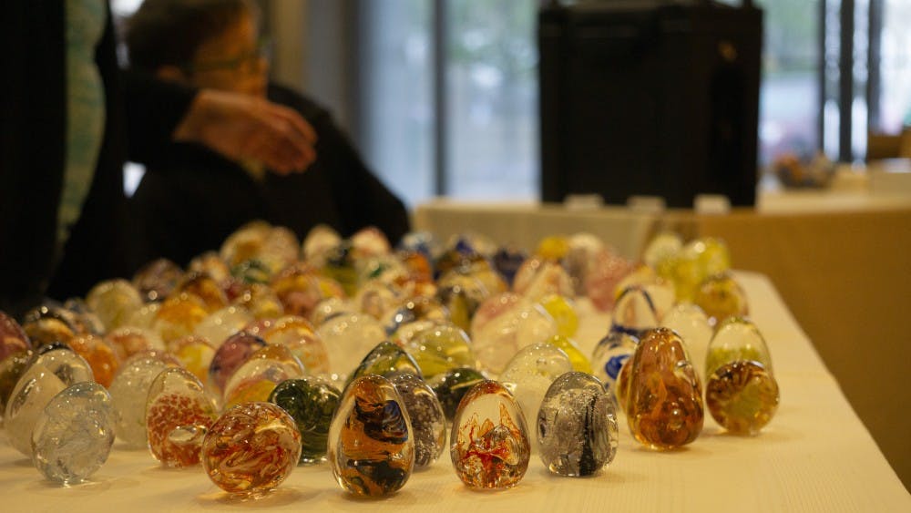 <p>Glass Easter eggs, made by the Ball State Glass Alliance, sit on display on April 20, 2019, at the Minnetrista Gathering Center for the Minnetrista Glass Easter Egg Hunt. Participants were tasked with finding the glass eggs around the gathering center. <strong>John Lynch, DN.&nbsp;</strong></p>
