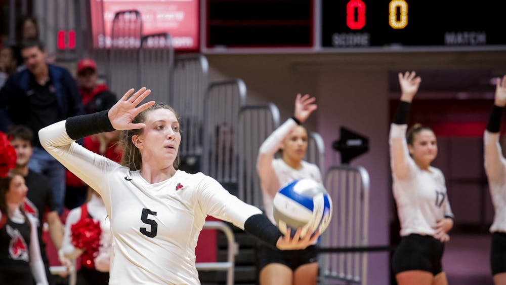 Freshman middle blocker, Marie Plitt (5), sets up to serve during the third match against Miami Redhawks on October 25, 2019, at John E. Worthen Arena. Miami defeated the Cardinals 3-0. Omari Smith, DN