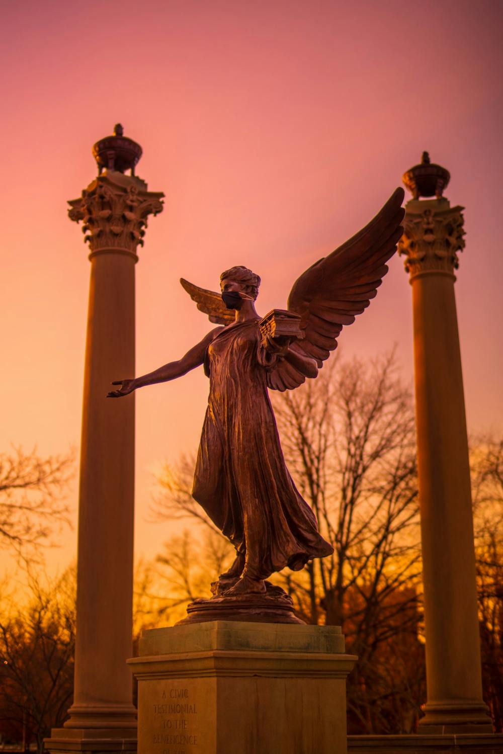 <p>Finished in 1937, the Beneficence statue or “Benny” was the last piece of work commissioned from sculptor Daniel Chester French. Isaac Miller, the video media intern at the Ball State Foundation, was able to capture Beneficence during sunset in February 2021. <strong>Isaac F. Miller, Contributor, DN File</strong></p>