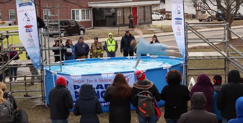 Phi Sigma Kappa raised thousands of dollars for the Special Olympics after 44 jumpers initiated the 2018 Polar Plunge challenge in 22-degree weather Feb. 3. Max Harp and Quentin Basnaw, DN