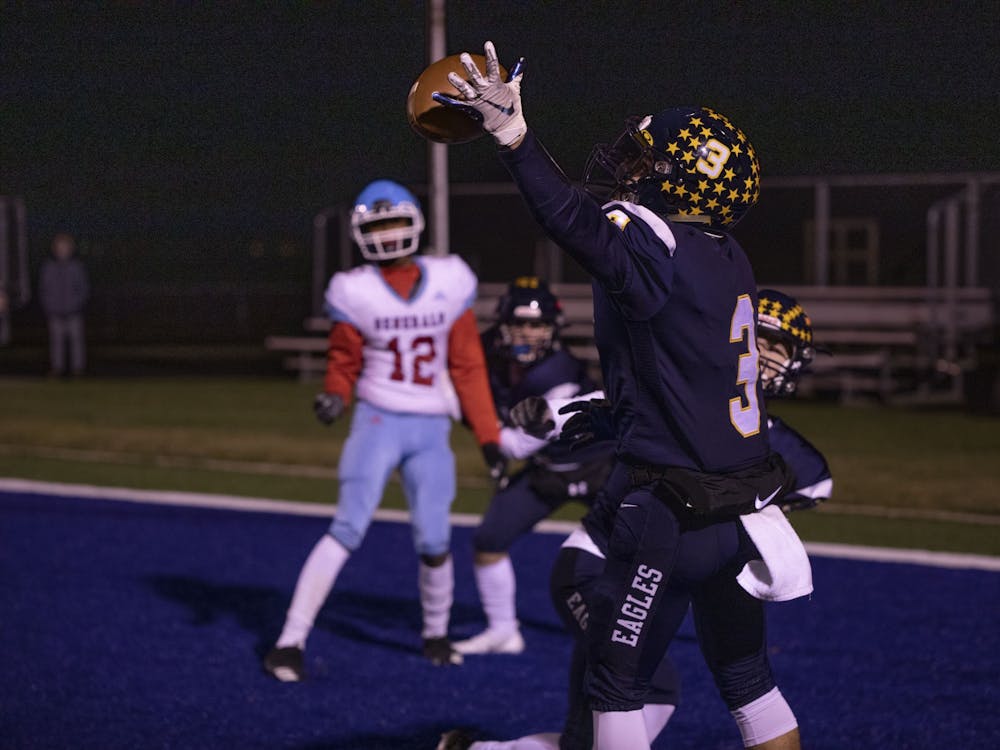 Eagles' senior wide receiver and cornerback Cody Howard catches the ball vs. Wayne Oct. 30, 2020 in sectional action at Delta High School. The Eagles defeated the Generals 49-18. Connor Smith, DN.