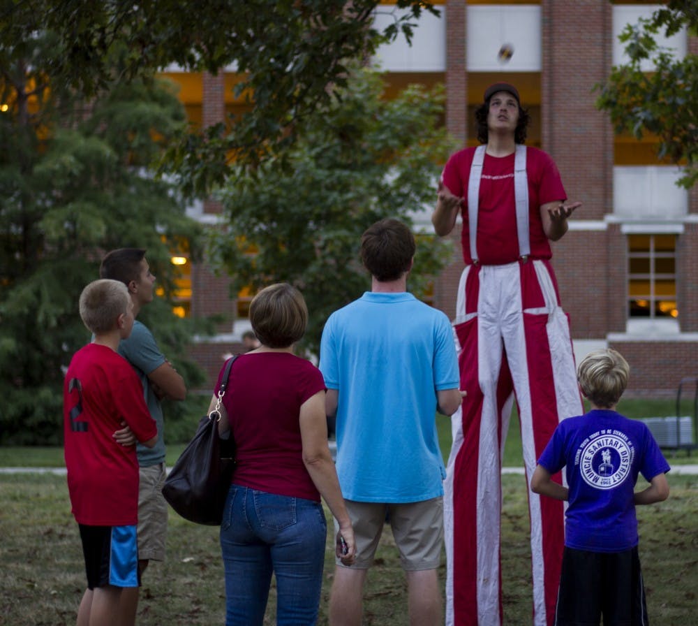 The Homecoming Village on Monday night kicked off Homecoming Week. There were a number of things for people to do, including getting a henna tattoo, getting their palms read, and even a man juggling on stilts. 