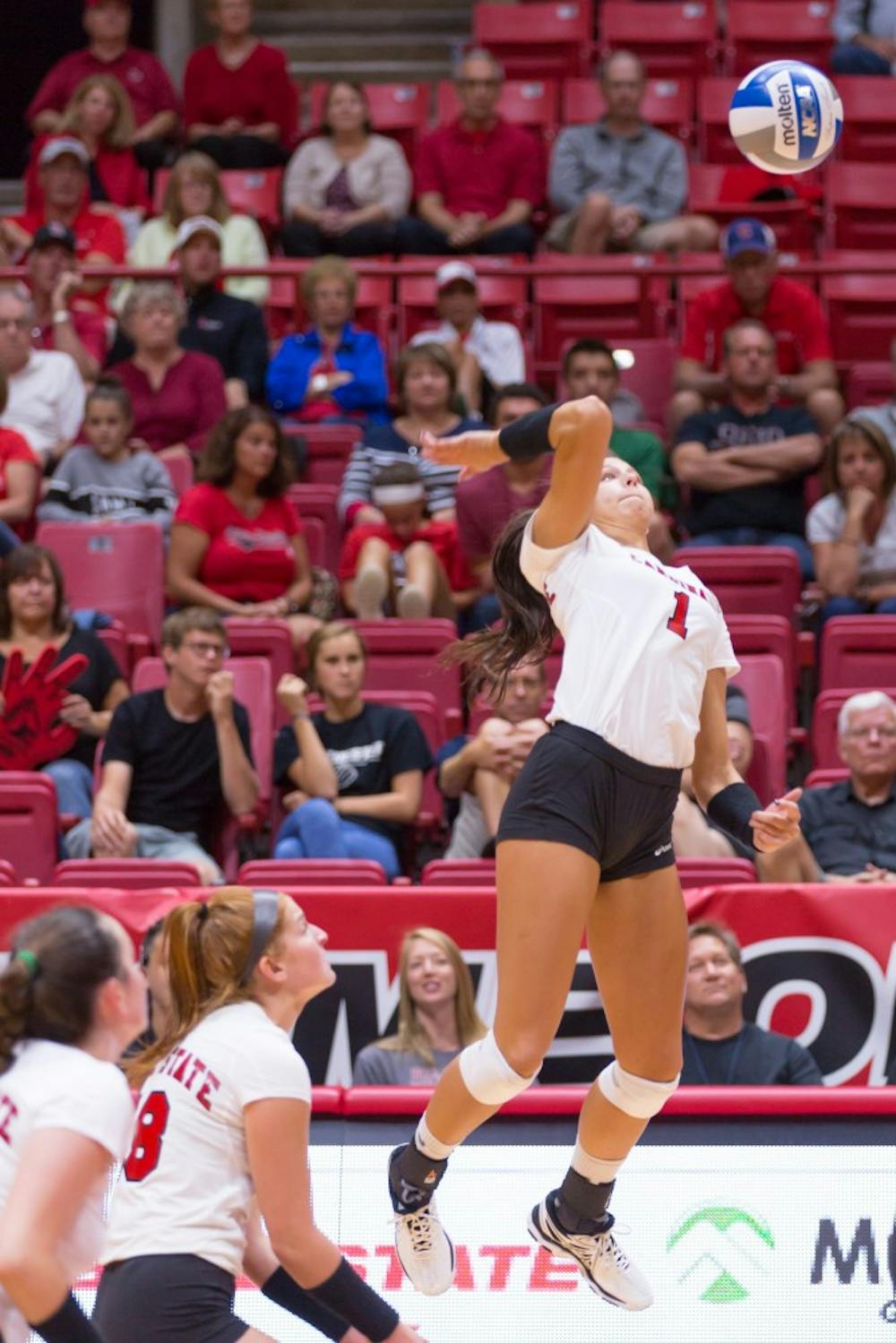 Senior outside hitter Mackenzie Kitchel jumps up to spike the ball at the game against Valparaiso on Sept. 16 at John E. Worthen Arena. Kyle Crawford // DN