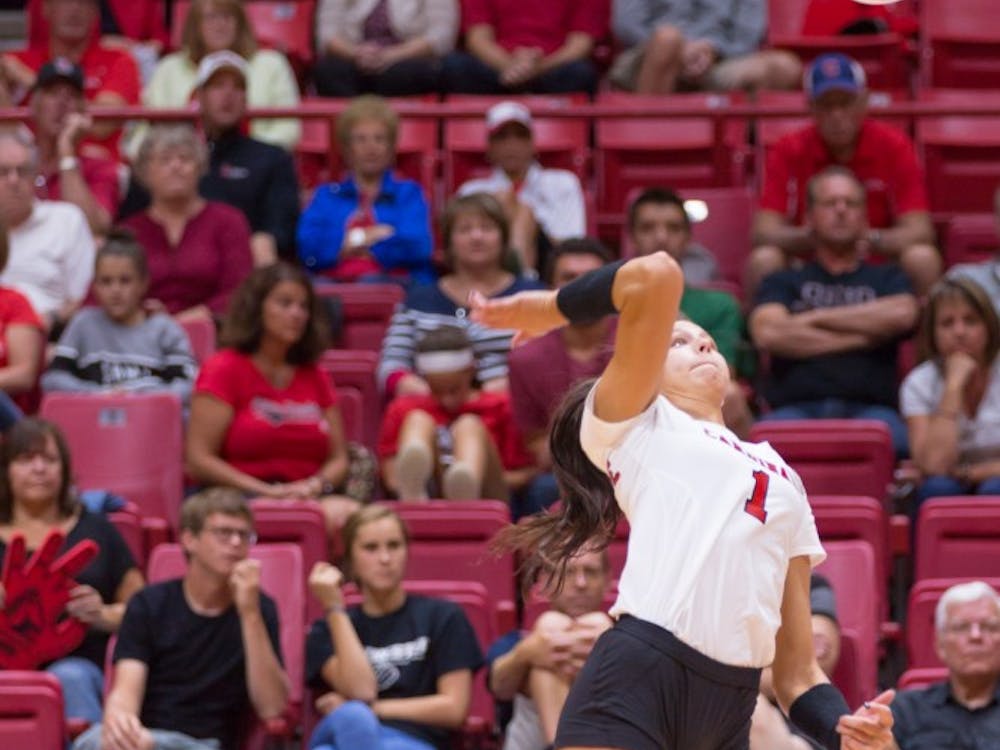 Senior outside hitter Mackenzie Kitchel jumps up to spike the ball at the game against Valparaiso on Sept. 16 at John E. Worthen Arena. Kyle Crawford // DN