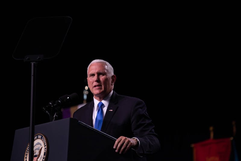 Pence speaks at Taylor University commencement, draws mixed reactions