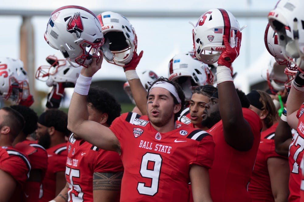 Redshirt Junior Quarterback Drew Plitt sings the Ball State fight song with his team Oct. 19, 2019 at Scheumann Stadium. Plitt had 206 yard against the Toledo Rockets. Jacob Musselman, DN