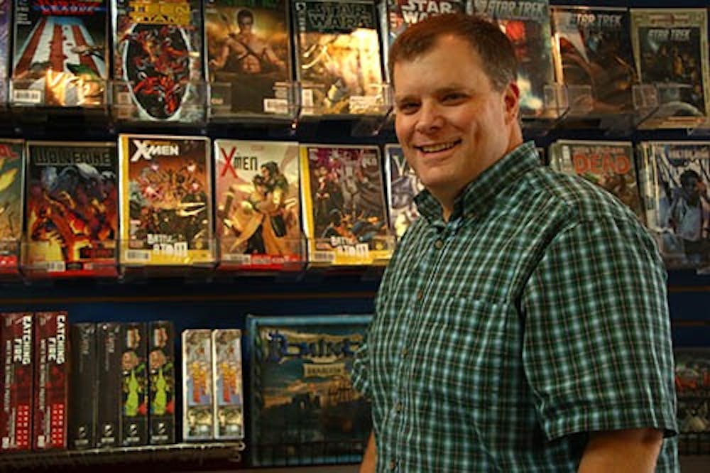 Slade Smith, a Ball State alumnus, is the owner of Atomic Comics Games and Music at 120 N. Mulberry St. Smith said he wanted a comic book shop, despite the fact that it isn’t a lucrative career. DN PHOTO TAYLOR IRBY