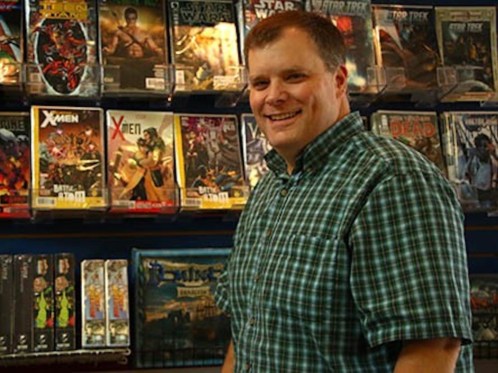Slade Smith, a Ball State alumnus, is the owner of Atomic Comics Games and Music at 120 N. Mulberry St. Smith said he wanted a comic book shop, despite the fact that it isn’t a lucrative career. DN PHOTO TAYLOR IRBY