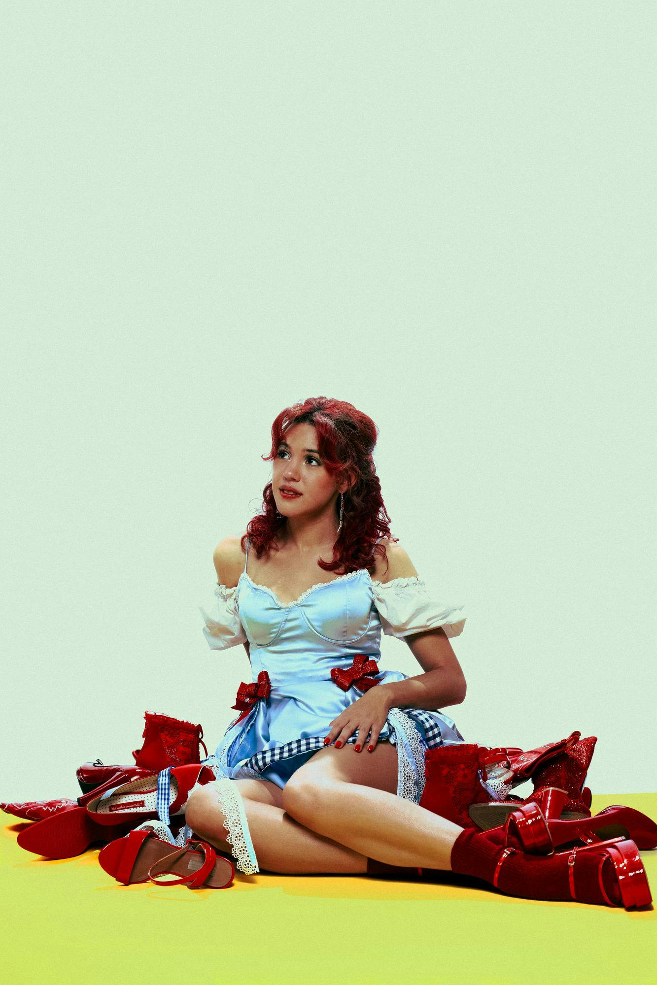 Brynn Allison poses for a photo for her album "Shoes". She thrifted over 25 pairs of shoes and made that dress. Talon Reed Cooper, Photo Provided