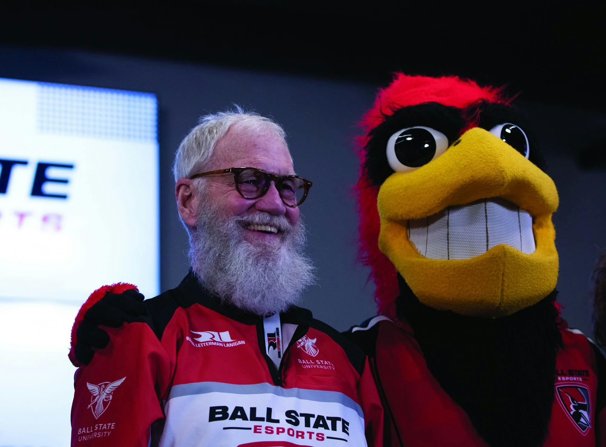 David Letterman poses for a photo with Charlie Cardinal Feb. 9 in the Robert Bell Building at Ball State University. Letterman visited campus to celebrate the Rahal Letterman Lanigan Racing Esports partnership. Eli Houser, DN