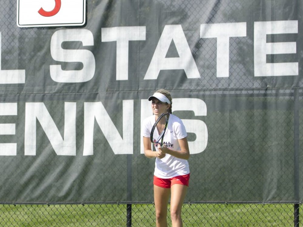 Junior Courtney Earnest waits for a serve during the doubles match against Butler for the Fall Dual on Sept. 20 at the Cardinal Creek Tennis Center. DN PHOTO BREANNA DAUGHERTY 