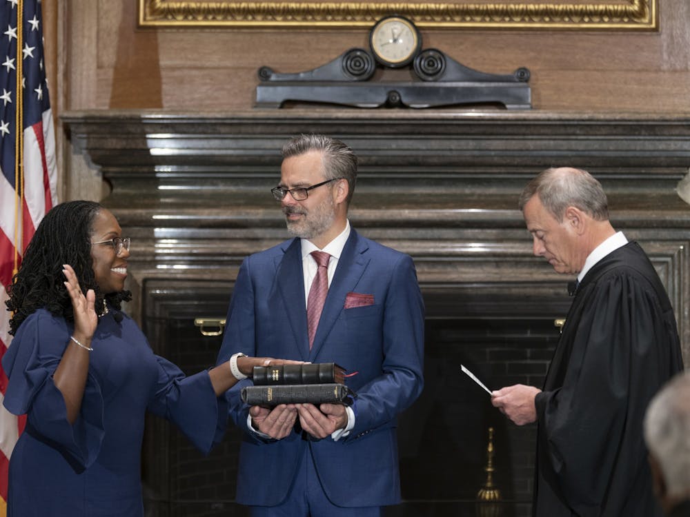 In a handout image provided by the U.S. Supreme Court, Chief Justice John G. Roberts, Jr., right, administers the Constitutional Oath to Judge Ketanji Brown Jackson, left, in the West Conference Room of the Supreme Court on Thursday, June 30, 2022, in Washington, D.C. Jackson was sworn in as the newest Supreme Court Justice, replacing the now-retired Justice Stephen G. Breyer. (Fred Schilling/Collection of the Supreme Court of the United States/Getty Images/TNS)
