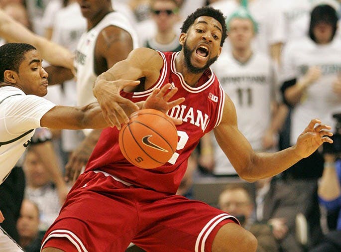Michigan State&apos;s Gary Harris, left, defends against Indiana&apos;s Christian Watford during first-half action at the Breslin Center in East Lansing, Michigan, on Tuesday, February 19, 2013. (Kirthmon F. Dozier/Detroit Free Press/MCT)